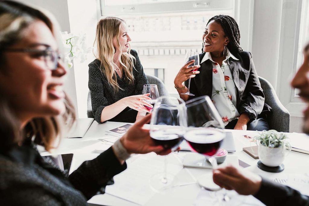 Business Women Drinking Wine